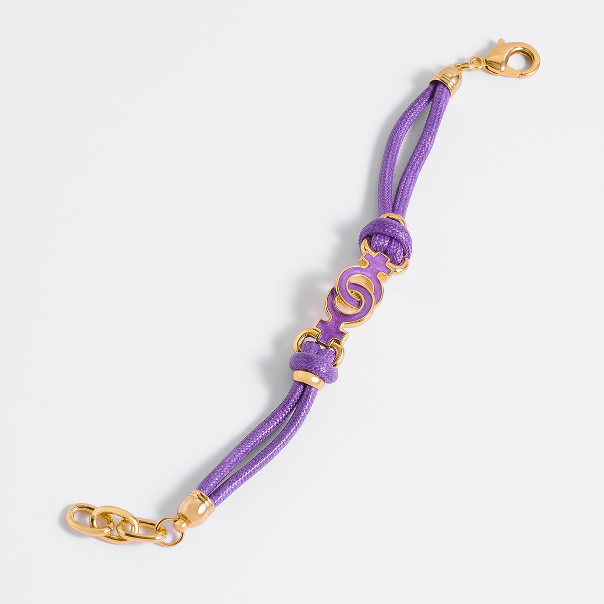 Pulsera baño de oro 18K con listones morados