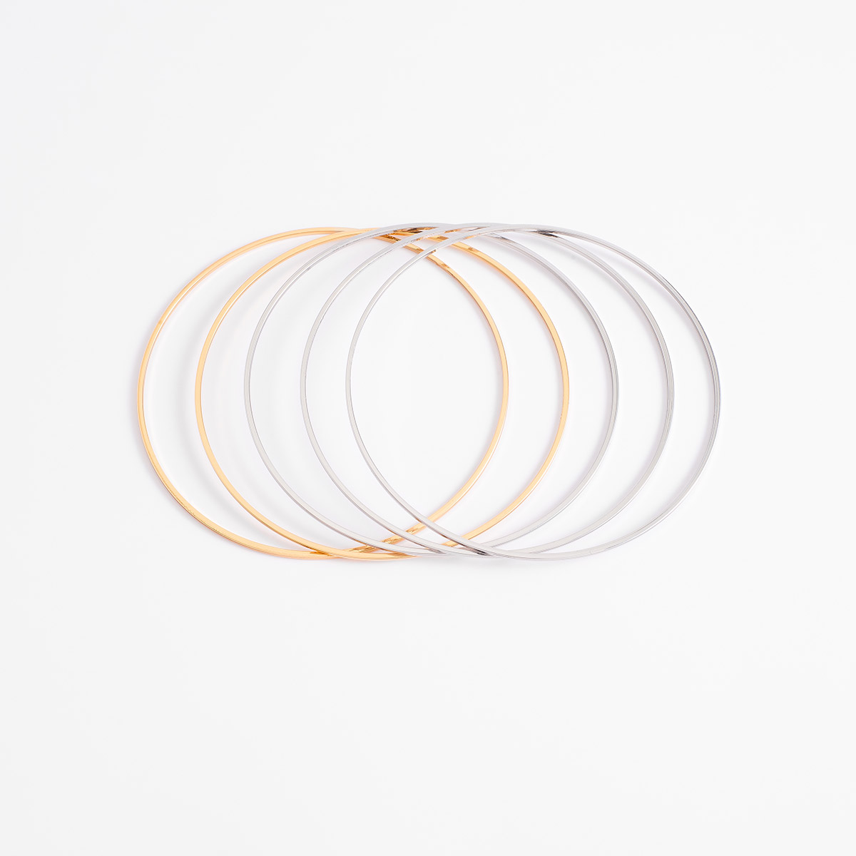 Set de pulseras delgadas en baño de oro y platino
